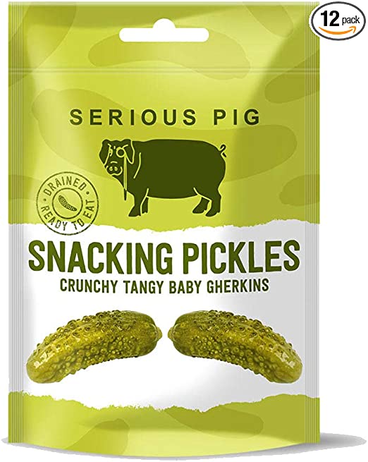 serious-pig-snacking-pickles